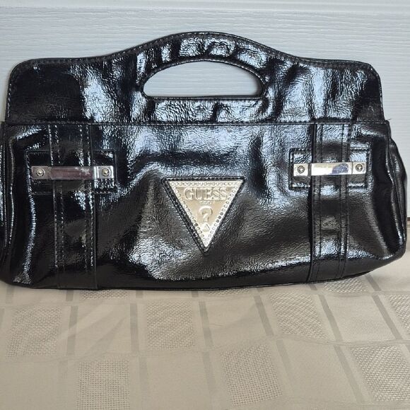 Guess Clutch Black Handbag with Silver Accents - Picture 16 of 16